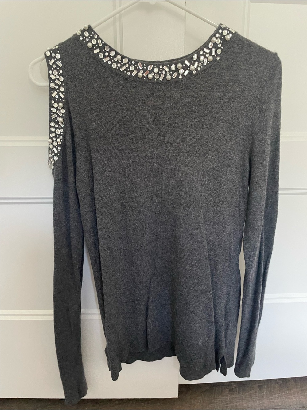 S - one shoulderless sweater with bedazzling